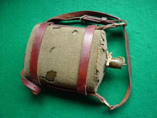 WORLD WAR TWO SOUTH AFRICAN ISSUE WATER BOTTLE / WITH LEATHER CRADLE FOR ARTILLERY