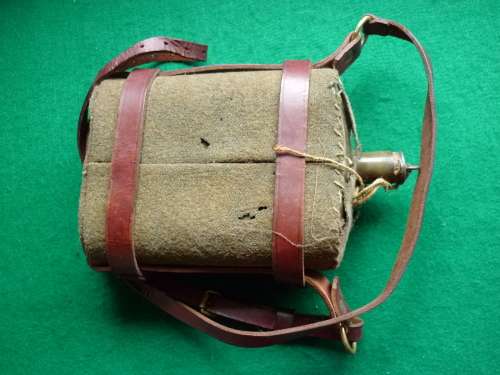 WORLD WAR TWO SOUTH AFRICAN ISSUE WATER BOTTLE / WITH LEATHER CRADLE FOR ARTILLERY
