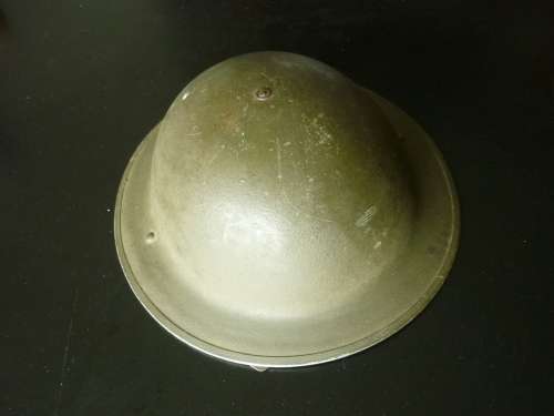 BRITISH WORLD WAR TWO BRODIE HELMET - GREEN FINISH = PAINT IN GOOD CONDITION