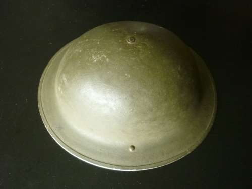 BRITISH WORLD WAR TWO BRODIE HELMET - GREEN FINISH = PAINT IN GOOD CONDITION