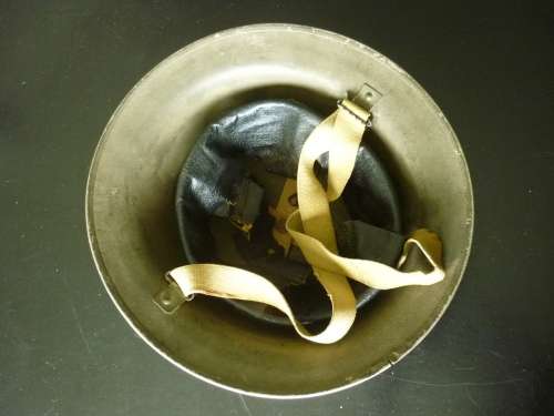 BRITISH WORLD WAR TWO BRODIE HELMET - GREEN FINISH = PAINT IN GOOD CONDITION