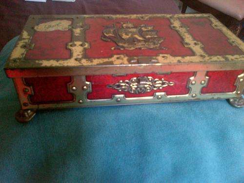 antique tin box with puple lining inside