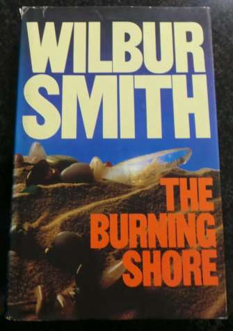 The Burning Shore by WILBUR SMITH - LARGE HARDCOVER - Good Condition*
