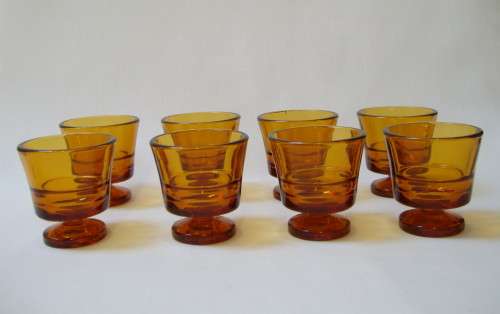SET OF EIGHT VINTAGE FRENCH DURALEX AMBER GLASS EGG-CUPS