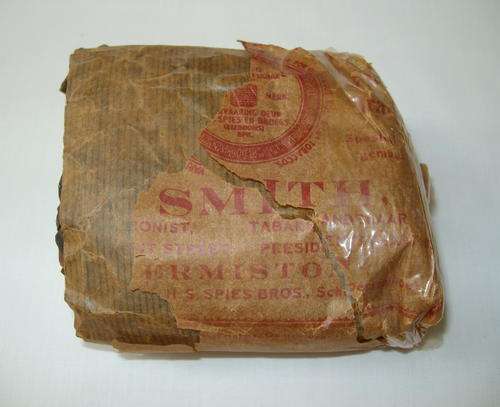 VINTAGE SMITH TOBACCONIST PIGTAIL TWIST TOBACCO ROLL