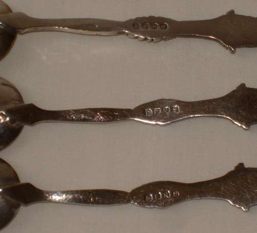 THREE VINTAGE DUTCH SILVER-PLATED WINDMILL COFFEE SPOONS