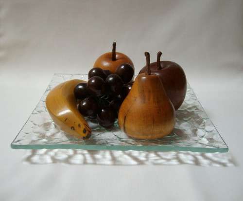 SELECTION of HANDMADE WOODEN FRUIT on GLASS PLATE by SANDY DICKIE