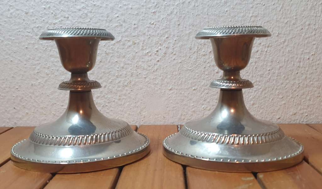 A PAIR OF VINTAGE  EPNS CANDLE STICK HOLDER
