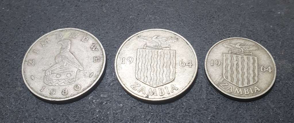 A SET OF THREE ZAMBIAN SHILLINGS & OTHERS.