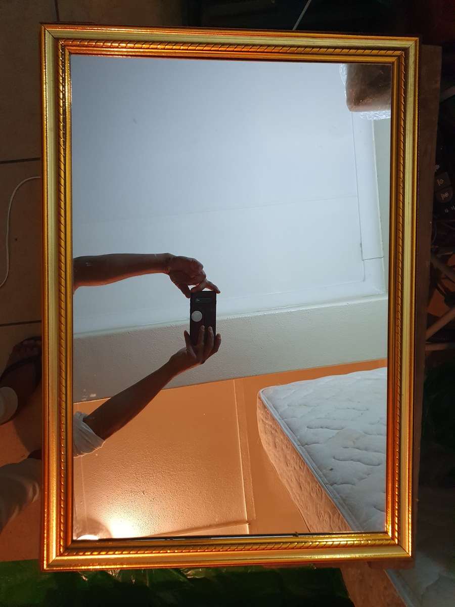 BRAND NEW HIGHLY POLISHED LARGE FRAMED MIRROR.