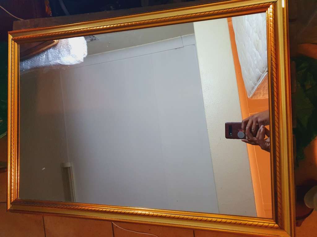 BRAND NEW HIGHLY POLISHED LARGE FRAMED MIRROR.