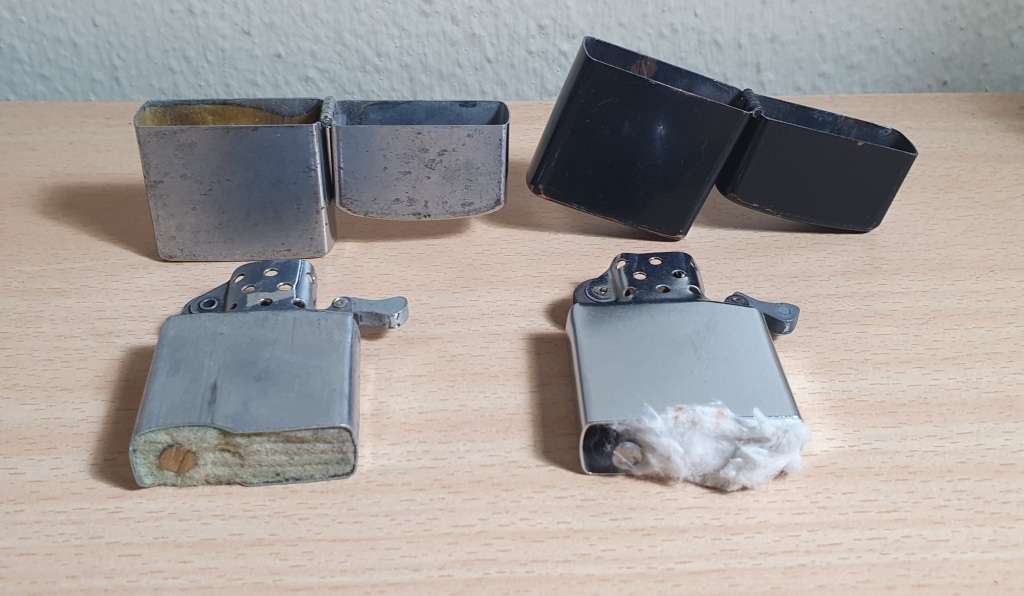 PAIR OF SECONDHAND ZIPPO STYLE LIGHTERS IN WORKING CONDITION.