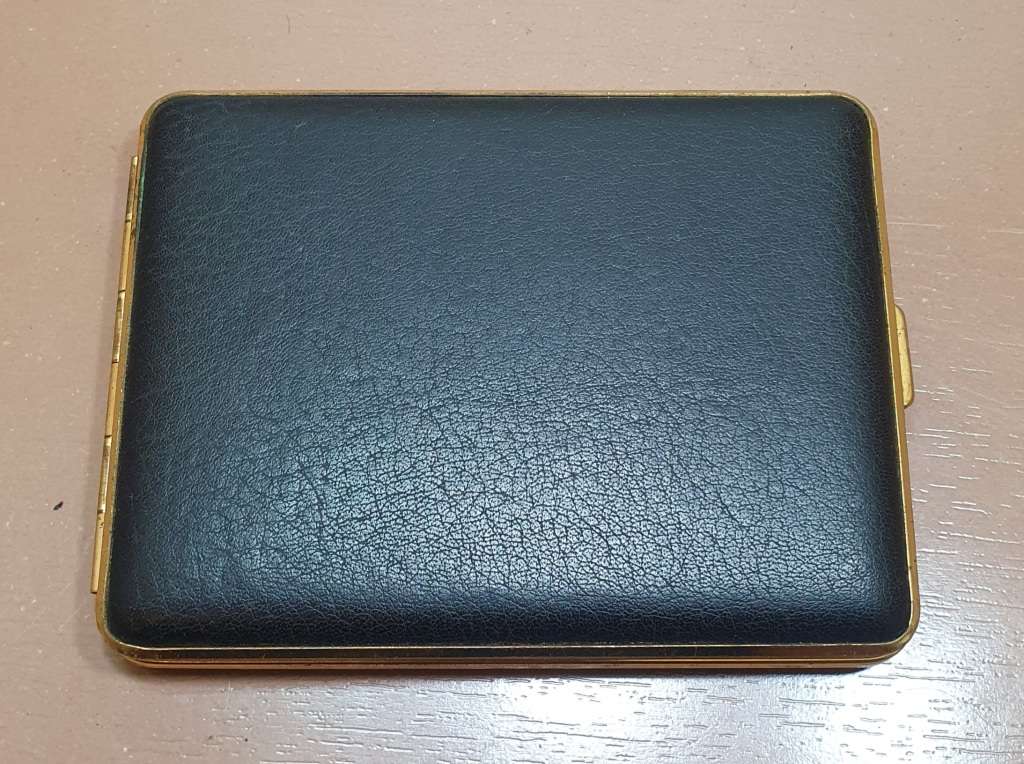 Vintage hallmarked W, Germany made padded quality Cigarette case in unused condition.