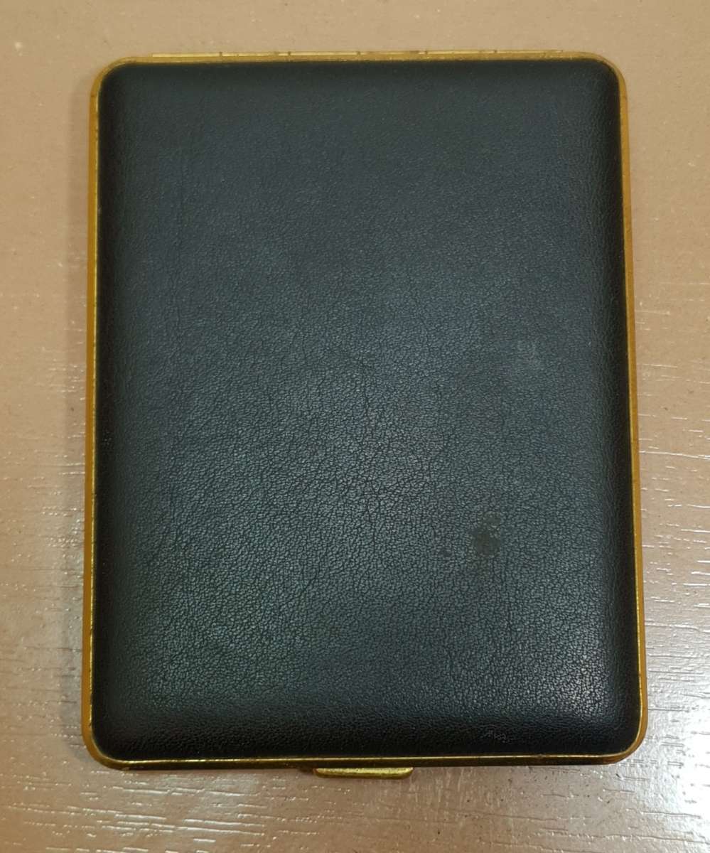 Vintage hallmarked W, Germany made padded quality Cigarette case in unused condition.
