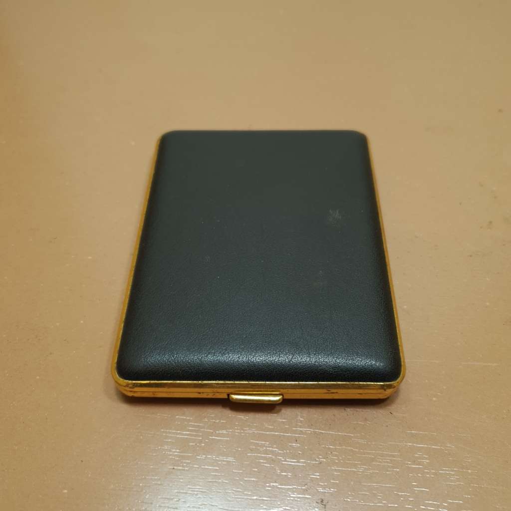 Vintage hallmarked W, Germany made padded quality Cigarette case in unused condition.