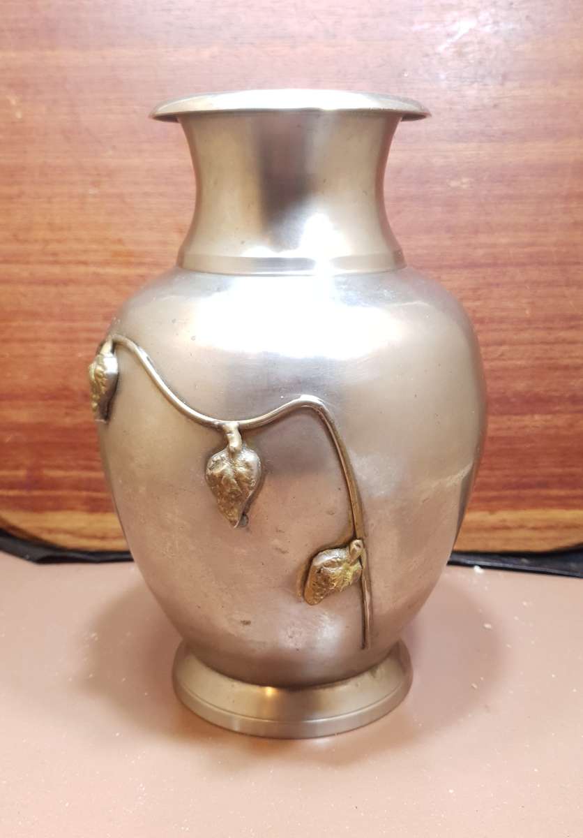 Vintage Oriental Solid bronze with Brass vine decorated Urn / Vase in good condition.