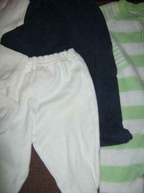 Lot of 11 babies' clothing, all newborn but 1 - R13.64 per item.