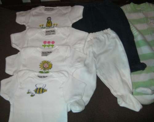 Lot of 11 babies' clothing, all newborn but 1 - R13.64 per item.