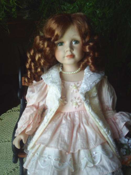 Porcelain Doll On Bench (40cm when seated)