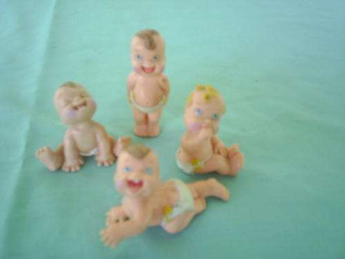 Lot of 4 Magic Diaper Babies