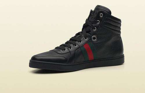 hi-top Gucci lace-up trainer with interlocking G and signature web detail.