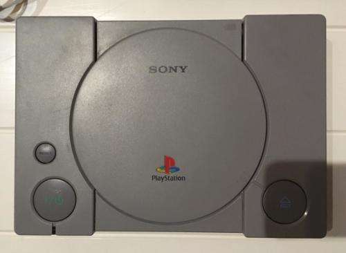 1st Generation Sony Playstation Console + 3 games