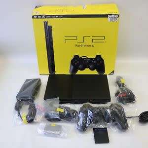 PS2 Console + Controller + 4 Games