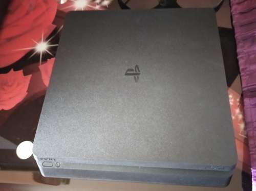 PS4 Slim Console + Controller + 25 Games