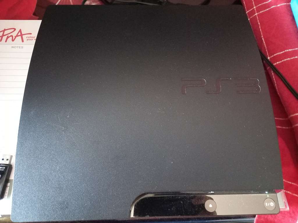 PlayStation 3 Console + 2 Controllers + 40 Games