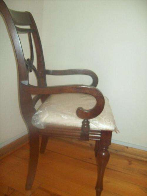 Very pretty .Brand new. Solid  wallnut armchair.Bargain