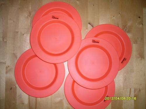 6 x orange plastic plates.