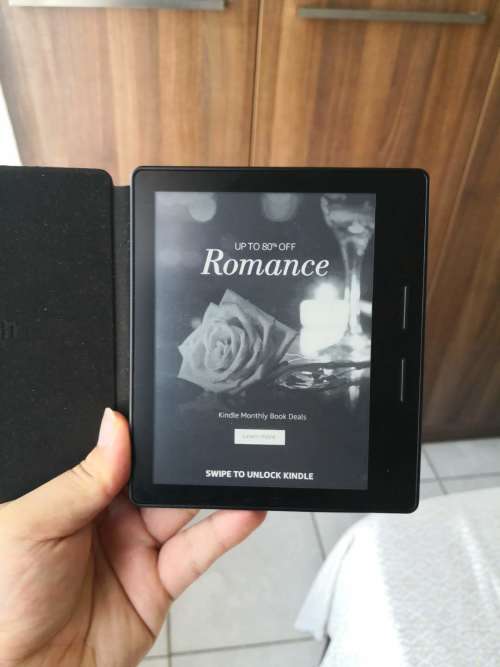 Kindle Oasis E-reader - 7" High-Resolution Display (300 ppi),  Built-In Audible  with Battery Cover!