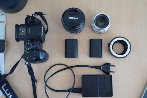 Panasonic Lumix GH4 Mirrorless Camera with 25mm/0.95 prime lense and a 36~72mm/3.5 zoom lense