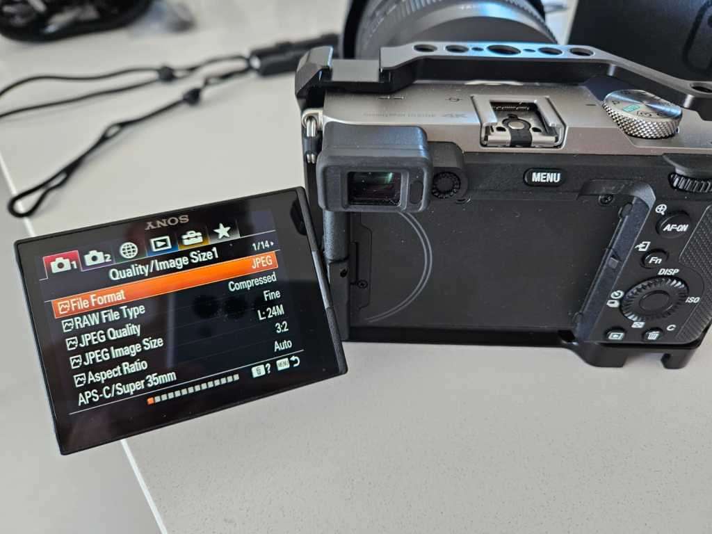 Sony Alpha a7C Mirrorless Digital Camera with a protection cage- DEMO Unit