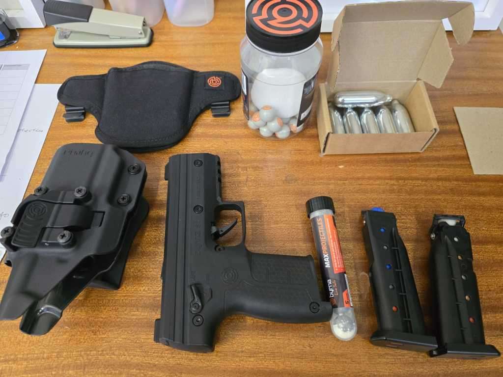 The Byrna SD (Self-Defence) Hand Gun with two holsters and a lot of free Projectiles and gas