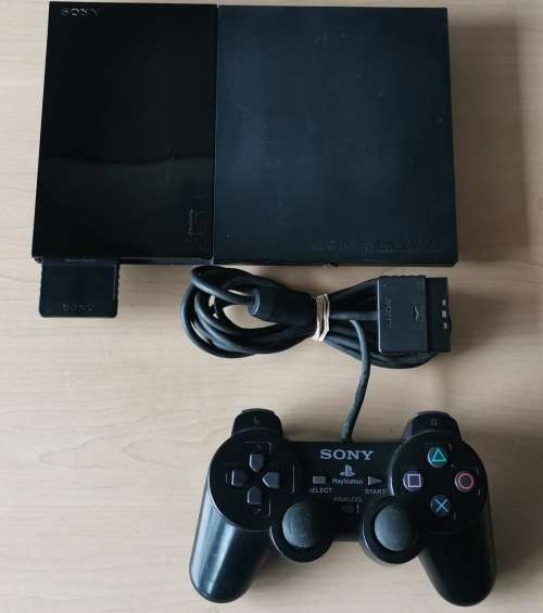 PlayStation 2 Slim with one Controller and 8MB Memory Card