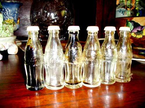 6 Vintage Miniature Coke a Cola bottles- sealed!