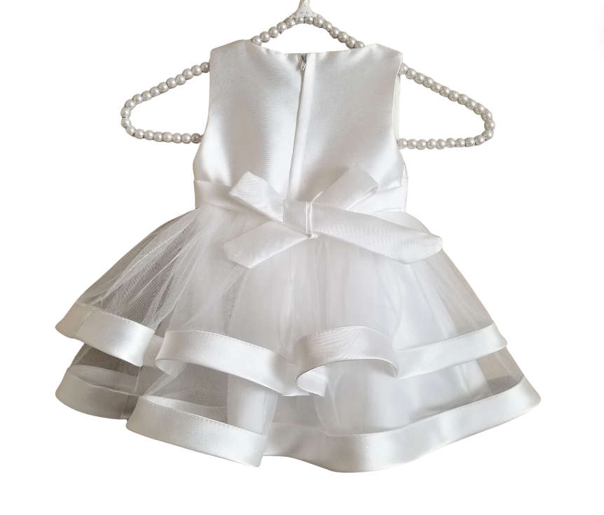 The cutest little white dress for a baby girl! Childrens size 60. 3-9 months old.
