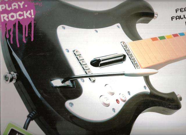 GET THE KIDS ROCKING WITH " GUITAR MAN "