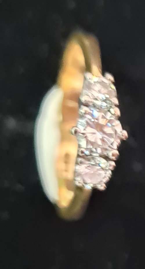 18 carat yellow gold, three diamond ring/ trio ring, with a 0.3 carat stone and two .15 carat stones