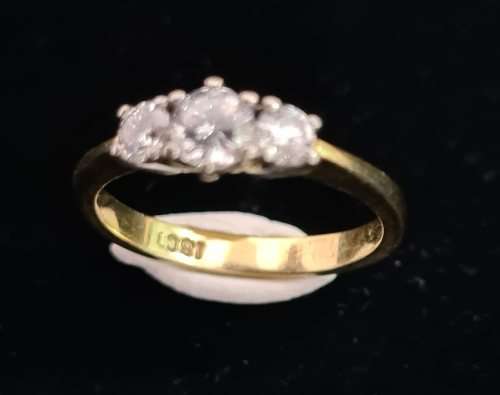 18 carat yellow gold, three diamond ring/ trio ring, with a 0.3 carat stone and two .15 carat stones