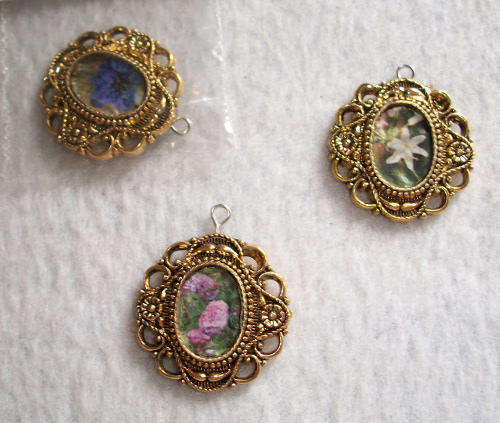 Miniature framed flower pictures.