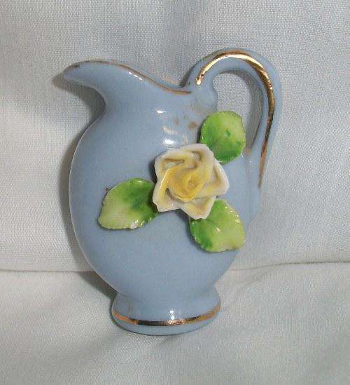 Blue jug/vase with flower