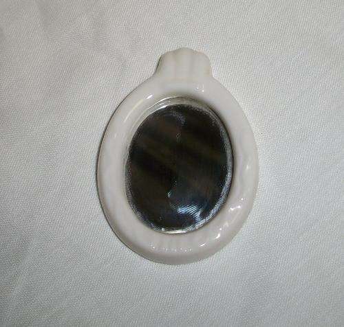 Miniature bathroom mirror