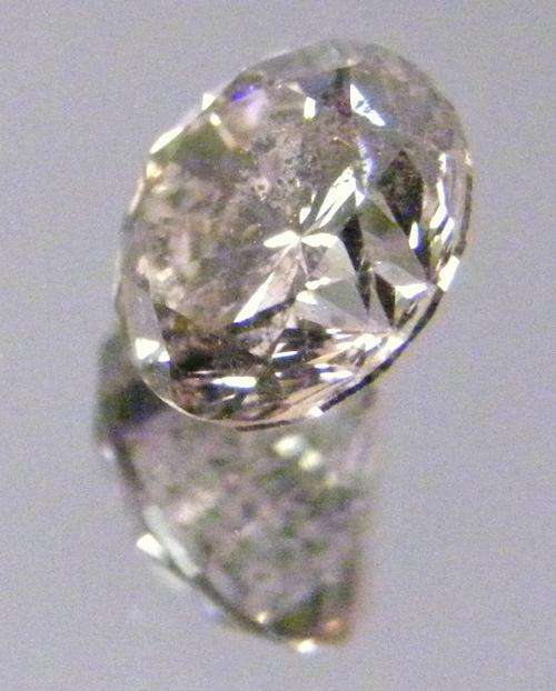 DAZZLING 0.73ct NATURAL K COLOUR SI2 DIAMOND
