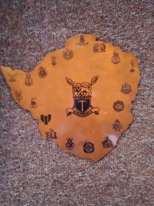 Copper wall mounting map of Rhodesia with military regimental badges