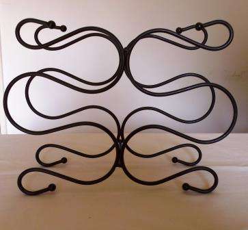 Metal Wine Rack holds 6 bottles
