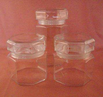 Three Glass Octagonal Storage Canisters