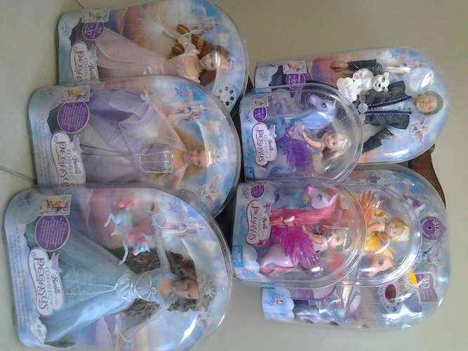 Complete set of Barbie and the Magic of Pegasus dolls including DVD 2005