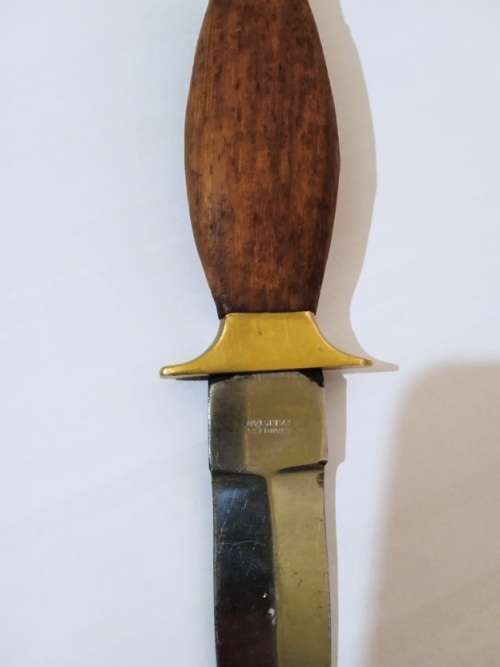 Dagger with brass and wood handle